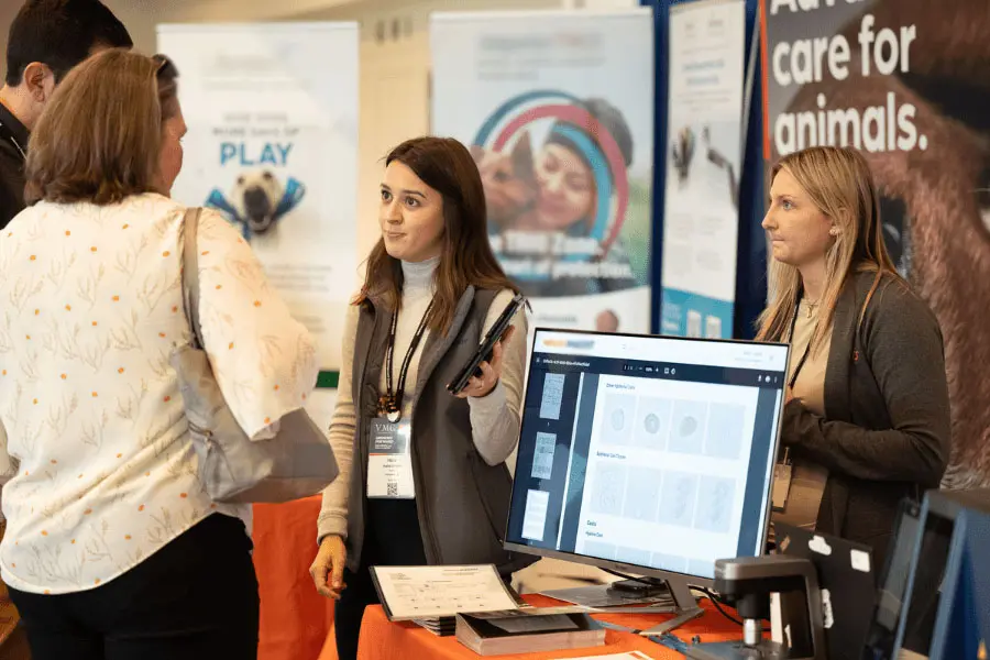 vendor demonstrating product to veterinarians