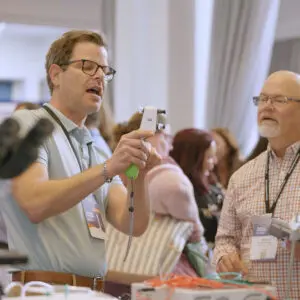 vendor demonstrating product to veterinarian